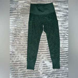Green Kirkland leggings with pockets. Size small.